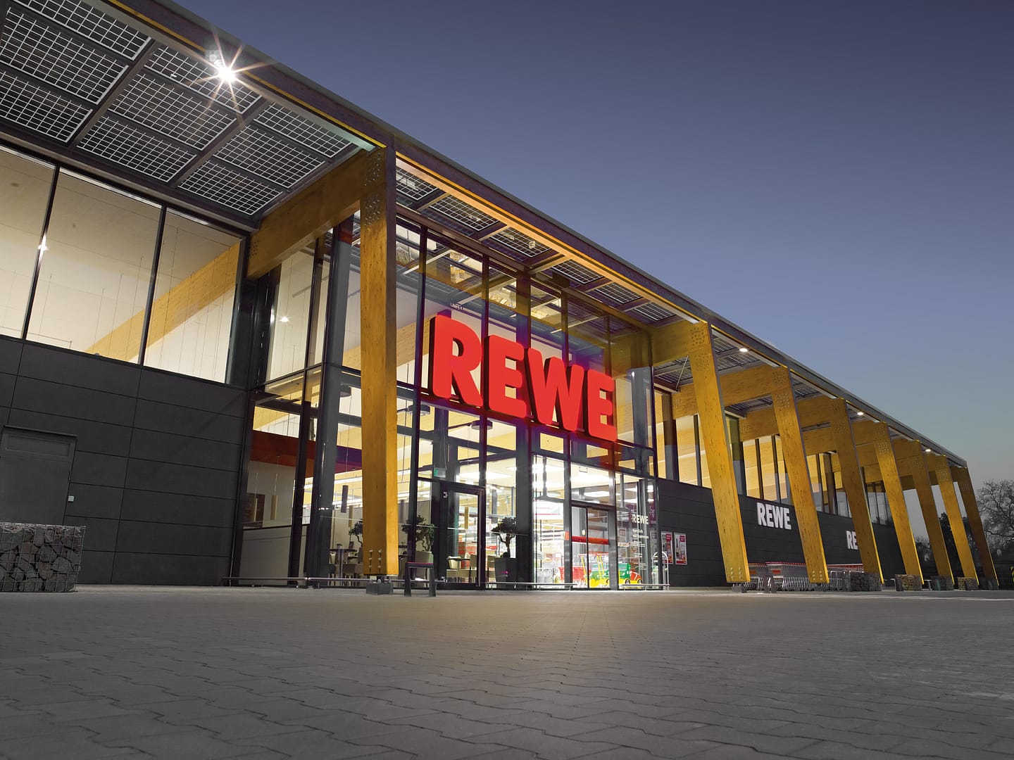 REWE Rosenheim. Rigorose Kundenabzocke durch Parküberwachung